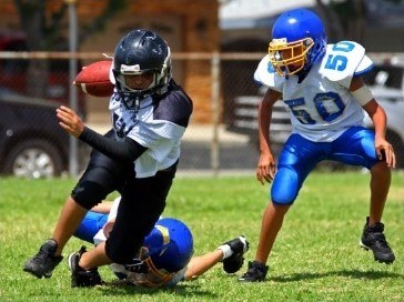 kids playing football